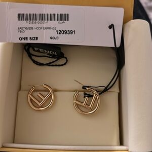 Fendi gold hoop F earrings. Worn once. With box, tags, etc